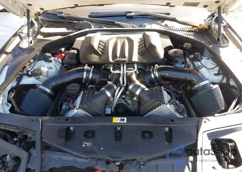 2016 BMW M5 z USA, uszkodzony, nr VIN WBSFV9C52GD595775